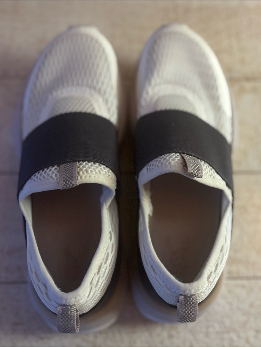 Sorel Women’s Slip-On Sneakers in White and Black